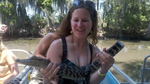 holding a baby alligator on a louisiana swamp tour