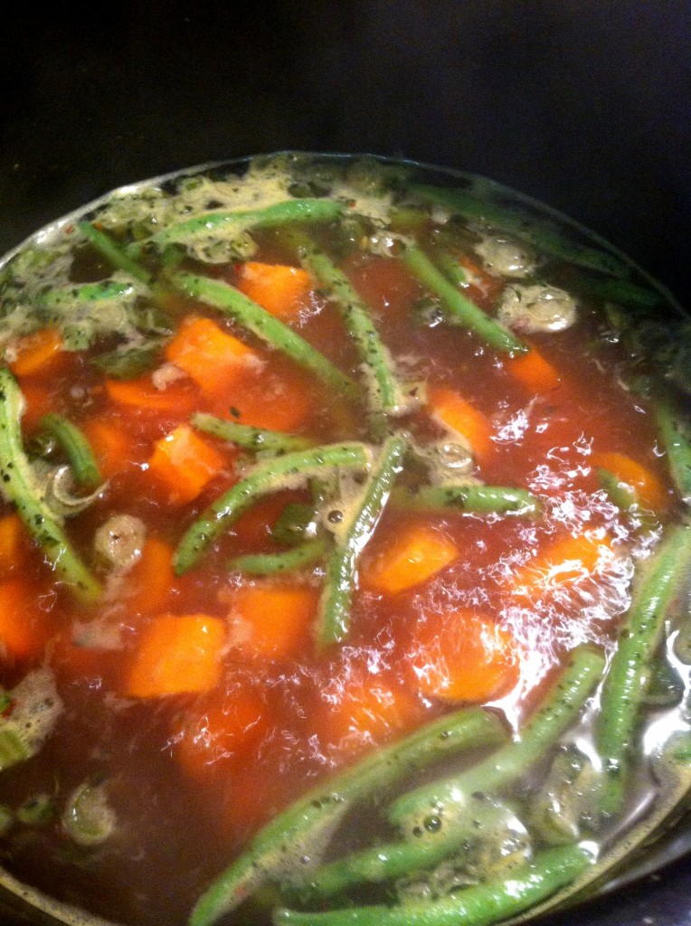 preparing the ramen soup
