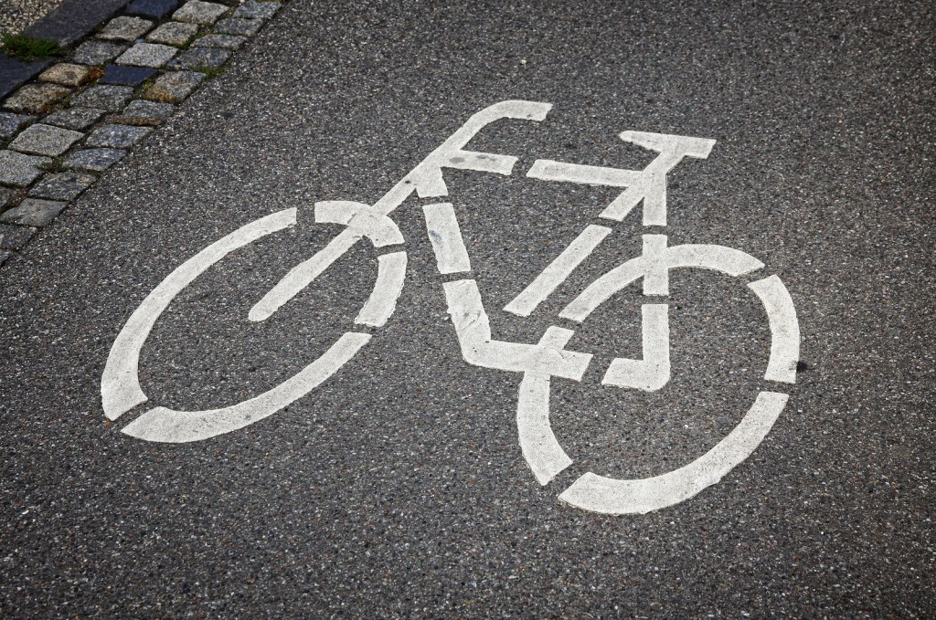 biking sign on the road