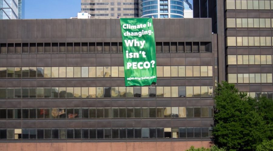 Three Activists Arrested After 50-Foot Banner Hung From PECO HQ