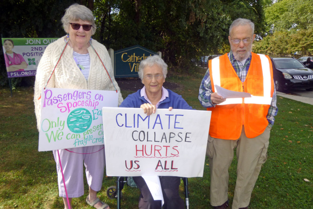 Seniors stand (and sit) in solidarity with millions who spoke out against climate change