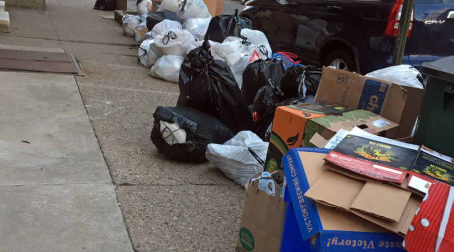As the city denies commands for combining trash and recycling, sanitation workers report not being paid accurately for overtime.