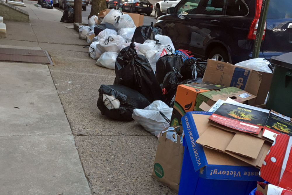 As the city denies commands for combining trash and recycling, sanitation workers report not being paid accurately for overtime.